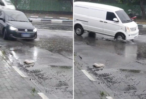 Buraco fica alagado durante chuva e preocupa moradores em cruzamento de Poá